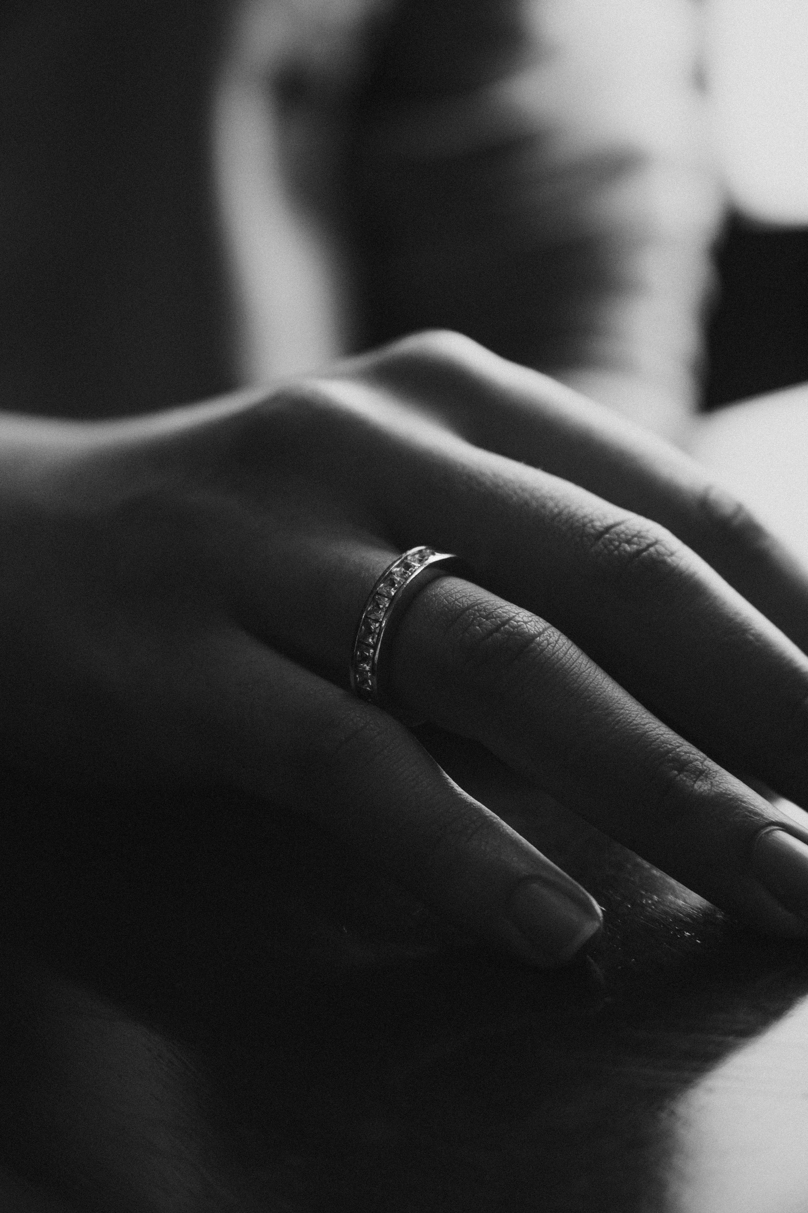 A close-up of a dazzling Tashvi Jewels diamond engagement ring on a hand